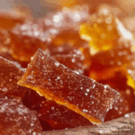 Cinnamon Rock Candy cooling on tray with powdered sugar